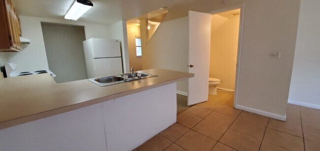 Building Photo - 5110 E. 28th Ave. Unit A-B