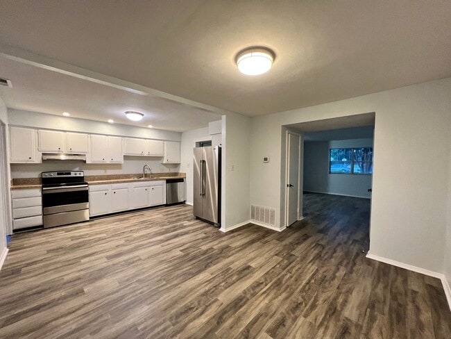 Building Photo - Three-bedroom, two-and-a-half bathrooms in...
