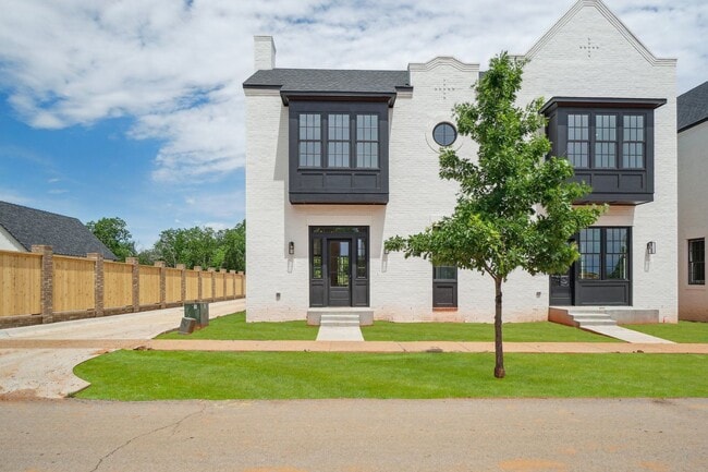 Building Photo - Classic Cape Cod Meets Modern Glam: Your D...