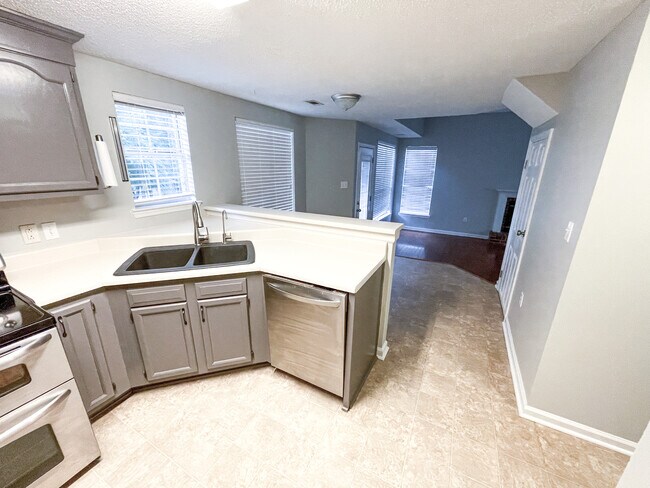 Kitchen, stainless steel appliances and breakfast nook - 102 Glouster Cir