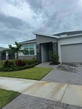 Building Photo - 10495 SW Orana Dr