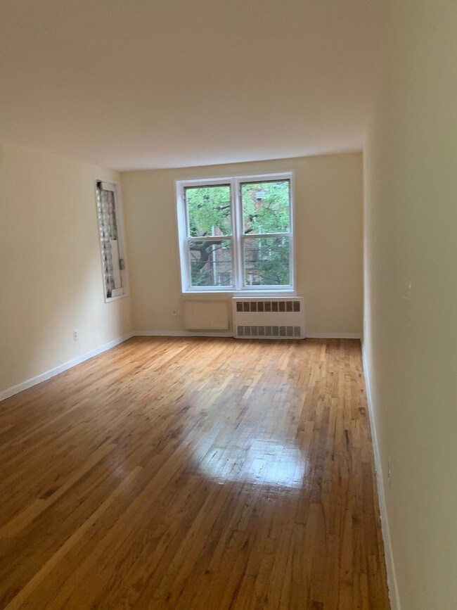 Building Photo - 65-04 Booth St