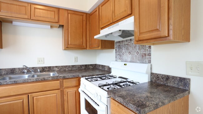 Kitchen - renovated 2BR, 1.5BA - 896 SF - Raintree Apartment Townhomes