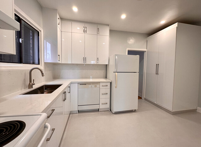 Building Photo - Spacious, Renovated 2-Bedroom Main Floor A...