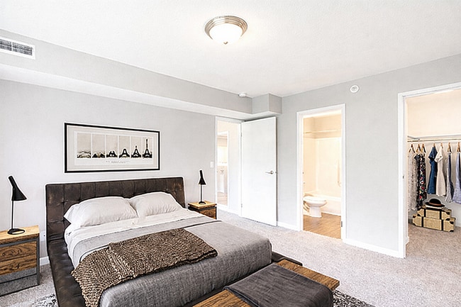 Central Park Apartments Primary Bedroom with Walk-In Closet - Central Park Apartments