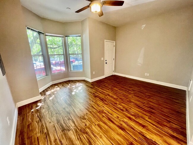 Building Photo - Prime Location! Modern 2BD/1 BA with A/C & EV Charging Steps from Mississippi