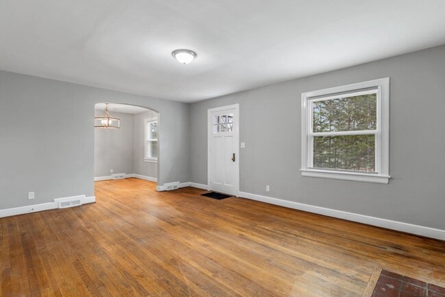 Building Photo - Brick home, Two Story, Hardwoods, 4 Bed Plus 2 Sun Rooms, DR, FP, Carport!.