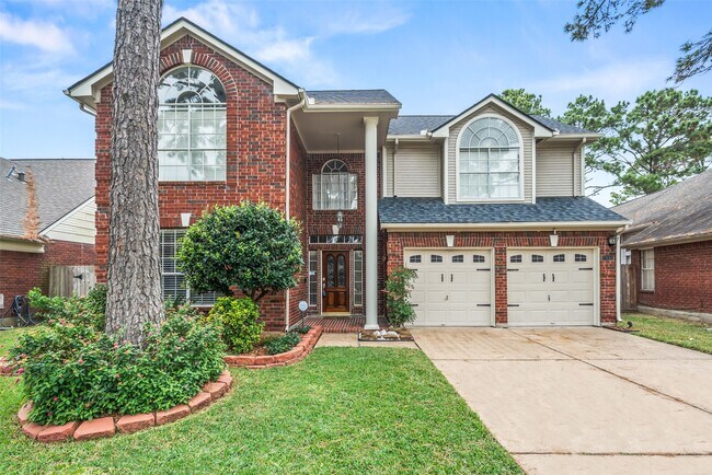 Foto del edificio - 7911 Hidden Oaks Ln