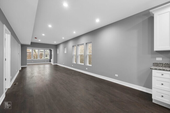 Building Photo - 7734 S Langley Ave