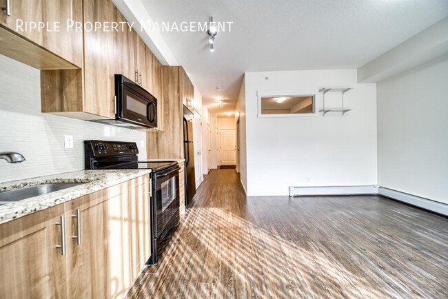 Photo du bâtiment - AMAZING 1 BED/1 BATH CONDO