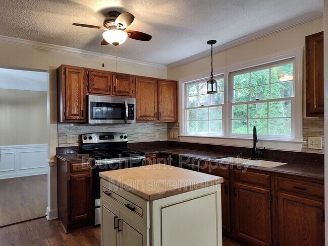 Building Photo - 7235 Kinsmore Ln