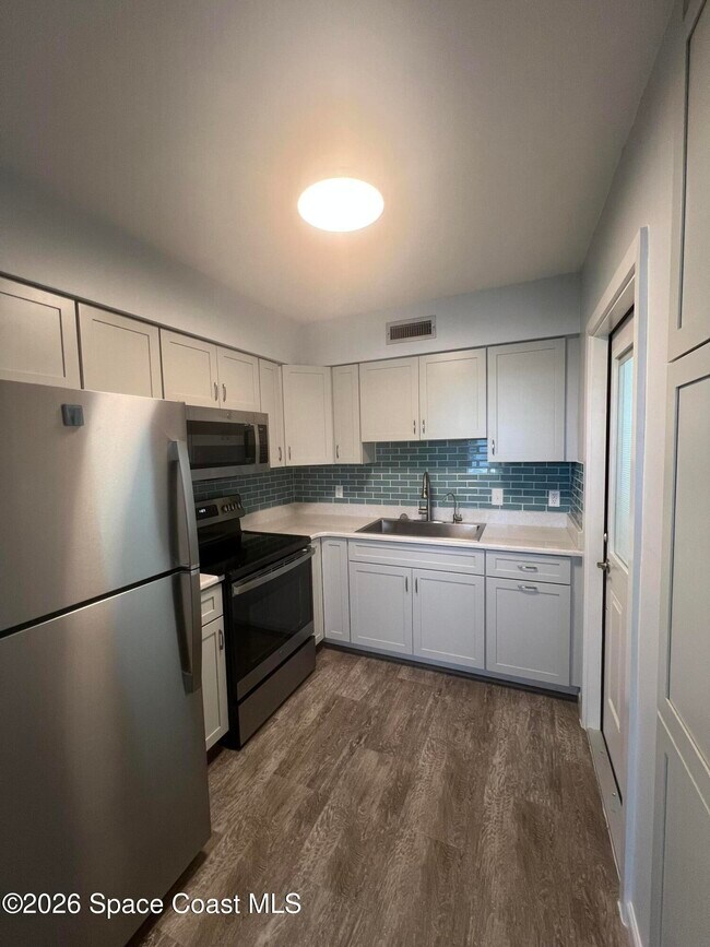 Building Photo - 8401 N Atlantic Ave