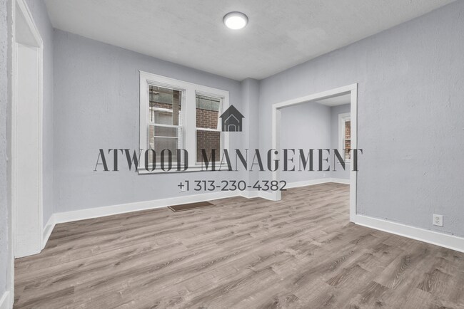 Building Photo - 8693 Woodlawn Ave