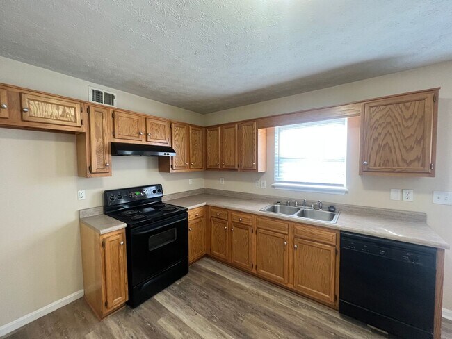 Building Photo - Cooper Farms! Okolona