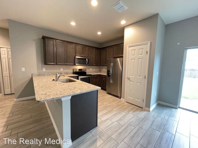 Foto del edificio - 3 br, 2 bath House - 491 Ixora Ave NW