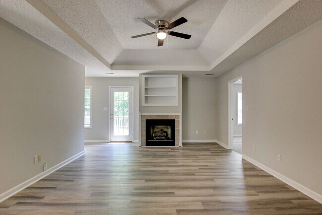 Building Photo - Stunning Brick Front Home With Fireplace And Hardwood Flooring In Sango Area