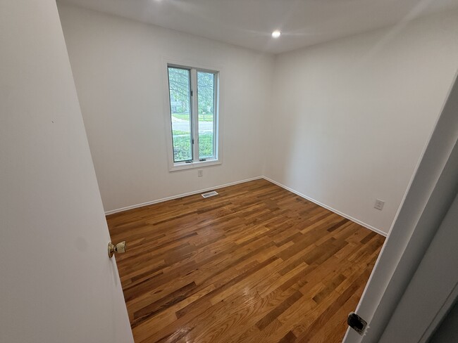 Front left bedroom - 6095 S Mohawk Ave