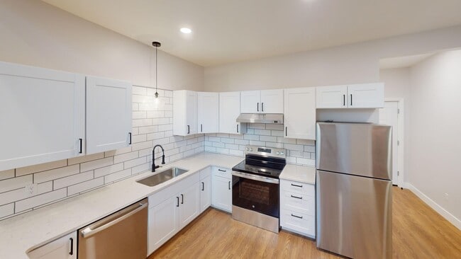 Building Photo - Blackboard District at Homes St School Apartments