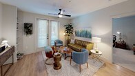 Located in the vibrant Oak Cliff neighborhood of Dallas, Texas, this single-floor residence at 612 N Zang Blvd offers a thoughtfully designed layout with modern finishes throughout. The kitchen is a standout feature, showcasing two-tone cabinetry in white and slate gray, white quartz countertops, subway tile backsplash, stainless steel appliances, and warm wood-look flooring. A generous island provides additional prep and serving space, while recessed lighting and a pendant fixture add a refined touch. The living area is welcoming and bright, benefiting from natural light through full-length French doors that open to an outdoor patio. A ceiling fan overhead and wood-look flooring contribute to the room's comfortable, contemporary feel. The flex room offers versatility as a home office or sitting area, complete with a ceiling fan, natural light from a window, and plush carpeting. The bedroom is a peaceful retreat featuring soft carpet, a ceiling fan, and a window that frames greenery outside. Both bathrooms are finished with classic white subway tile surrounds, soaking tubs, hexagonal penny tile flooring, gray vanity cabinetry, and matte black hardware accents. A walk-in closet adjoins one bathroom, adding practical storage. Together, these spaces create a cohesive, modern living environment with stylish details throughout.