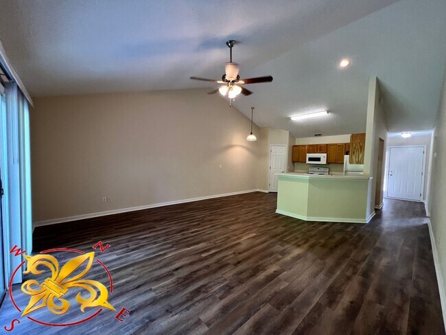Building Photo - Charming 3-Bedroom Home with Garage – Lawn...