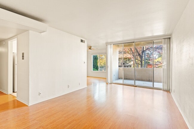 Building Photo - Utilities & Parking Included! Massive 2BD w/ Community Amenities