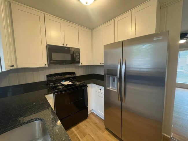 Building Photo - Welcome to Burgess2937, A Newly renovated charming 2-bedroom, 1-bathroom Duplex located in the vi...