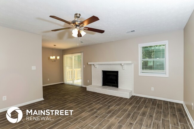 Building Photo - 9073 Woodgreen Way