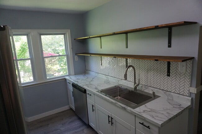 Newly remodeled kitchen with stainless steel appliances. - 5047 44th Ave S