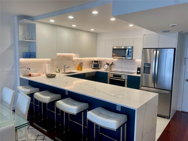 Building Photo - 5701 Collins Ave