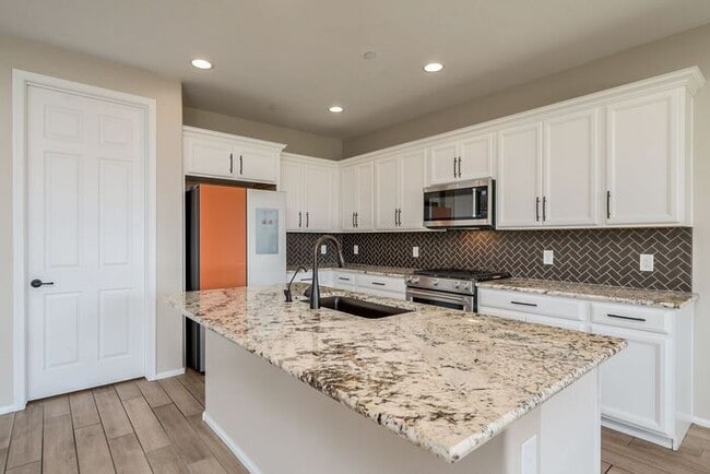 Building Photo - Amazing 4BR 2.5BA Home w/ 3-Car Tandem Garage • Pool Access • Yard w/ Fire Pit in Saguaro Trails