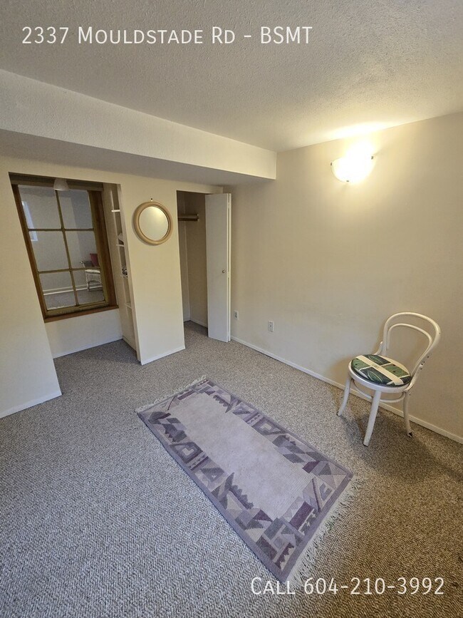 Photo du bâtiment - Cozy Basement Suite - Utilities Included