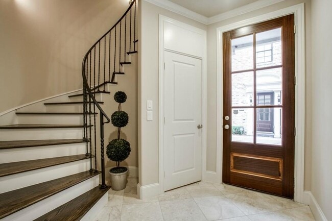 Building Photo - Striking Mediterranean 3-story townhome w 3 beds, 3.5 baths, 2 car & private backyard-patio