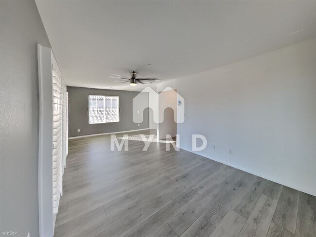 Building Photo - 4 br, 3.5 bath House - 8044 Mercury Skye St