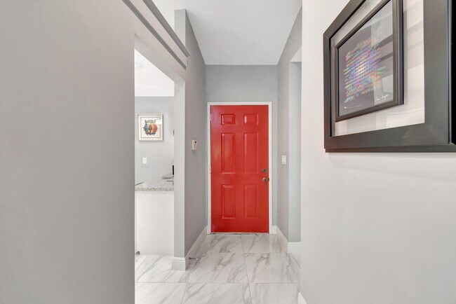 Building Photo - 10927 Dolphin Palm Ct