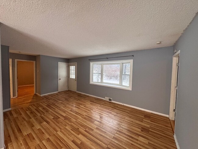 Building Photo - AVAILABLE NOW - Nicely rehabbed 3 Bedroom Single Family Home with Garage and Very Large Backyard