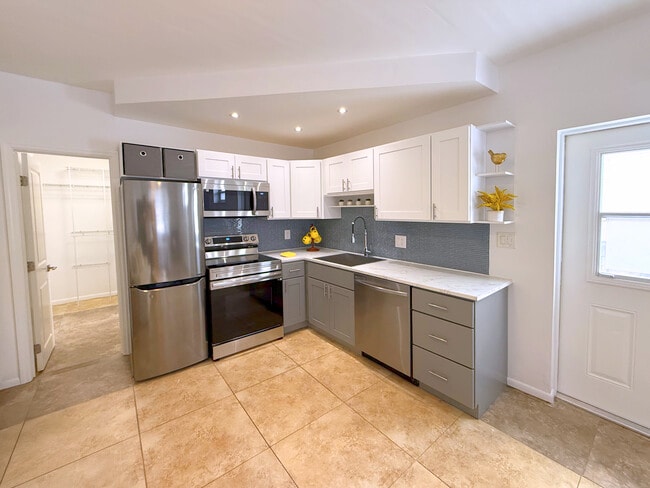 All new kitchen with stainless steel appliances - 630 NE 37th St