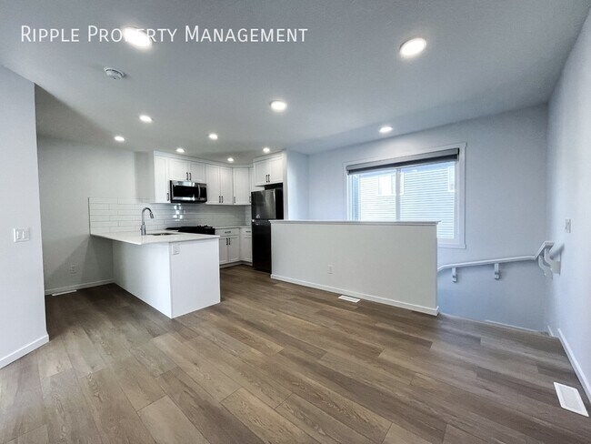Photo du bâtiment - AMAZING 1 BED LANEWAY SUITE | MODERN LIVING IN THE ORCHARDS