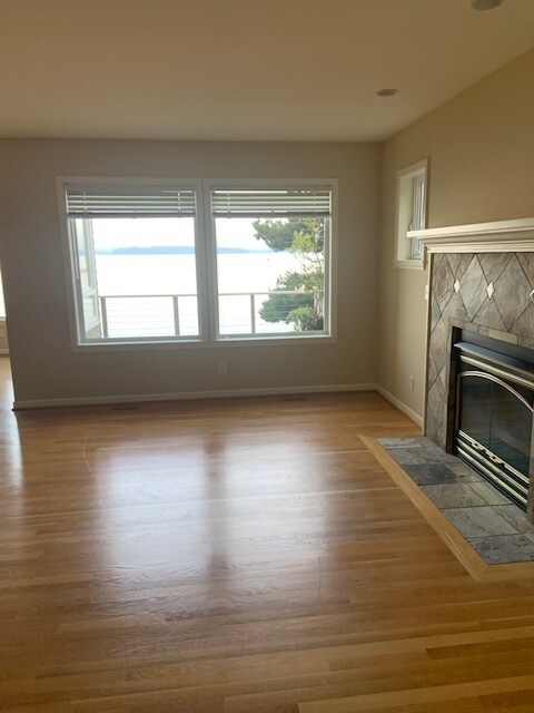 Living room with gas fireplace - 7117 Beach Dr SW