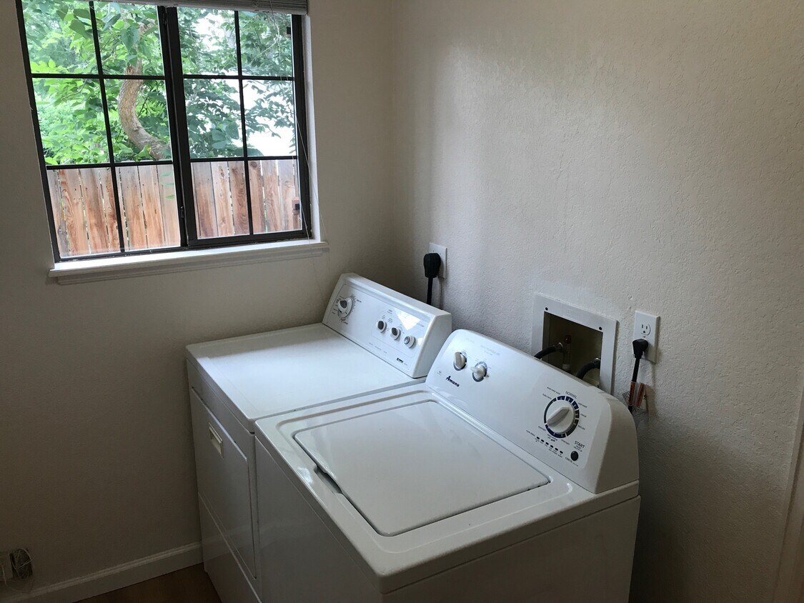 Laundry room in the unit. Washer & Dryer included - 5205 Cody St