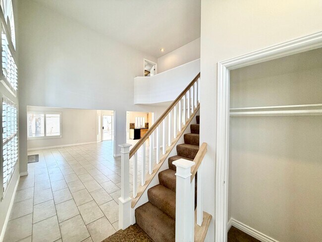Building Photo - Open-Concept 4 Bedroom 2.5 Bathroom Home with Soaring Ceilings & Spacious Backyard