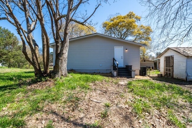 Building Photo - Renovated 3BR Gem in Dora!