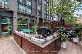 Building Photo - 1331 Queen St E