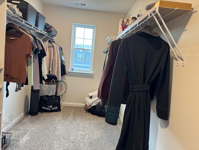 Walk in closet in primary bed room - 377 Aylesbury Ln