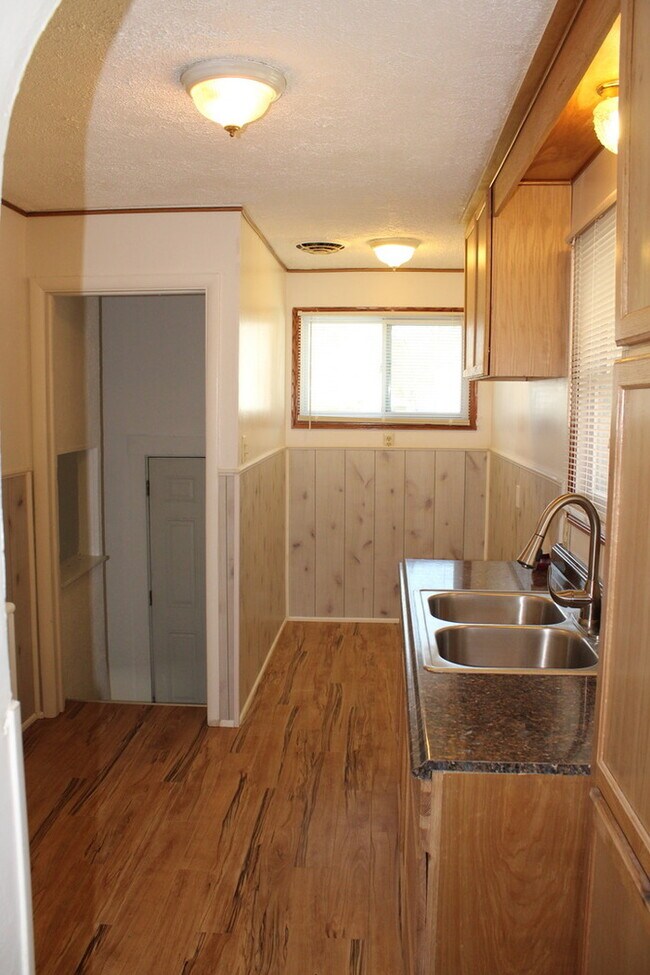 Building Photo - Sunny and renovated home (Open to Section 8)