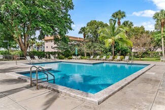 Building Photo - 6075 N Sabal Palm Blvd