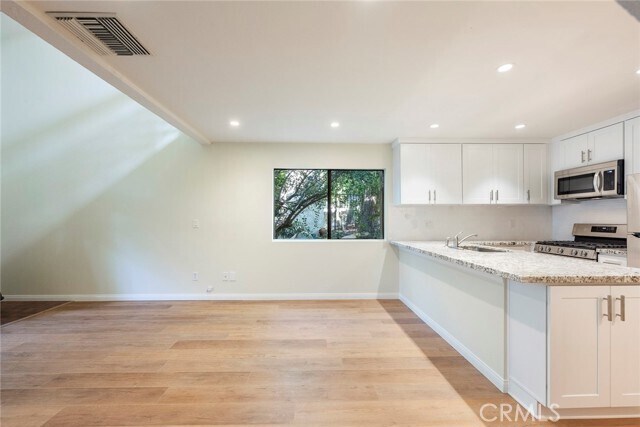 Foto del edificio - 4900 4900 E Chapman Ave