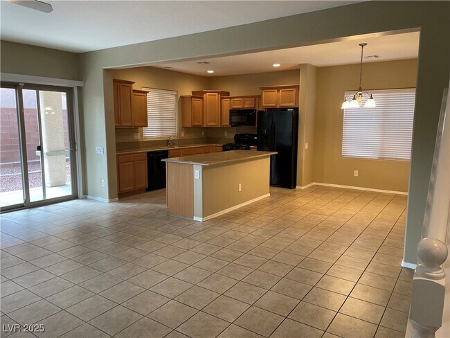 Building Photo - 10721 Arusha Ave