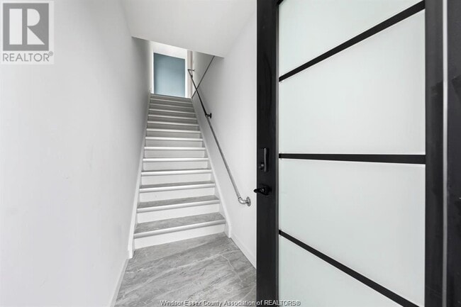 Building Photo - 687 Assumption St