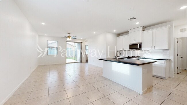 Building Photo - 40369 W Hillman Dr