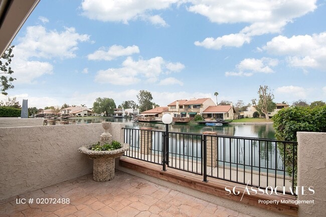 Building Photo - Adorable WATERFRONT Gated Lakeside Villas ...